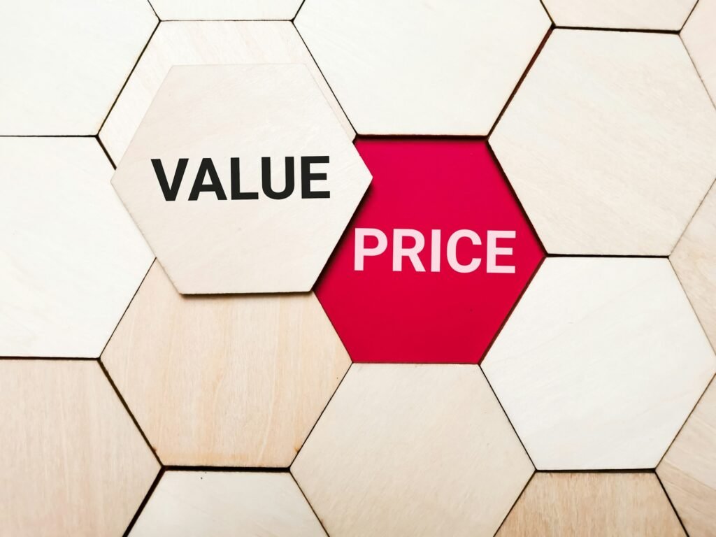 Value ang price written on wooden hexagon.
